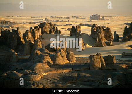 Algeria. Near Tamanrasset. Tassili du Hoggar. Sahara desert. Moon Landscape, sand dunes and rocks. Stock Photo