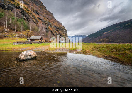 Small stream flowing into the fiord Stock Photo