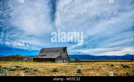 old wooden barn in the mountains in montana