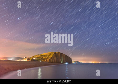 Star trails over West Bay in Dorset