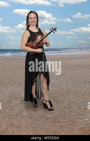 Woman Playing Violin Stock Photo