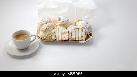 Cream puff cakes with whipped cream Stock Photo