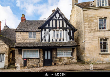 Sightseeing: Historic timbered house and Cotswold stone buildings in New Street, Painswick, an unspoilt village in the Gloucestershire Cotswolds Stock Photo