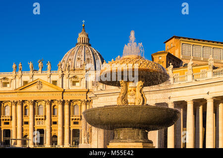 Bernini's fountains at St. Peter's square in early morning light, Vatican City, Rome, Italy. Stock Photo