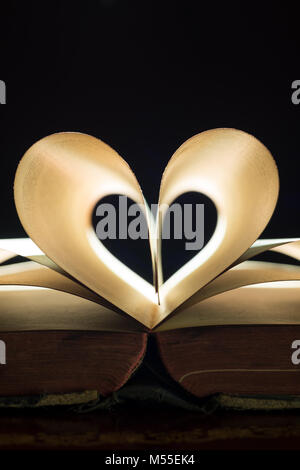 Large old antique book Duckworth's Encyclopedia of Useful Information and Atlas of the World 1891 much read and loved worn pages heart shaped pages Stock Photo