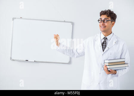 Funny doctor scientist making presentation in hospital Stock Photo