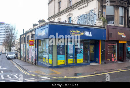 Brighton UK 20th Feb 2018 - A branch of the William Hill bookmaker firm on the corner of Sillwood Road and Western Road in Brighton this morning . The well known betting company has been hit with a £6.2m penalty package for breaching anti-money-laundering and social responsibility regulations  Credit: Simon Dack/Alamy Live News Stock Photo