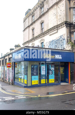 Brighton UK 20th Feb 2018 - A branch of the William Hill bookmaker firm on the corner of Sillwood Road and Western Road in Brighton this morning . The well known betting company has been hit with a £6.2m penalty package for breaching anti-money-laundering and social responsibility regulations  Credit: Simon Dack/Alamy Live News Stock Photo