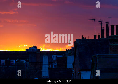 Northampton, U.K. 20th February 2018. Weather. Colourful end to the day looking over the rooftops. Credit: Keith J Smith./Alamy Live News Stock Photo