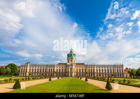 BERLIN, GERMANY - JUNE 30, 2014: Facade view of Charlottenburg Palace and garden in Berlin, Germany. The palace with its gardens are a major tourist a Stock Photo
