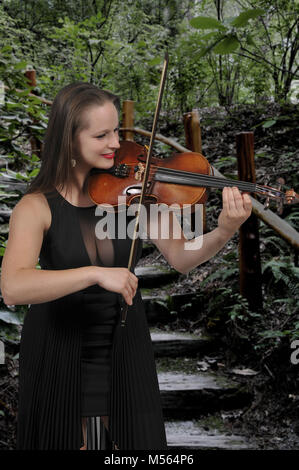Woman Playing Violin Stock Photo