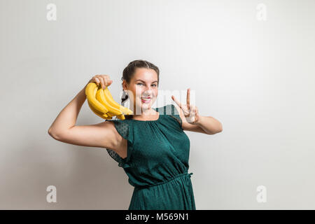 Young girl is happy to get fresh fruits Stock Photo