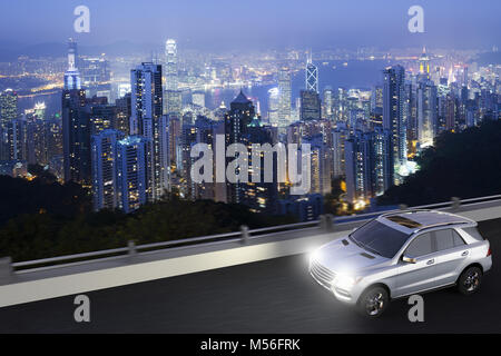 3D rendering of a SUV on motion with Hong kong skyline on the back Stock Photo