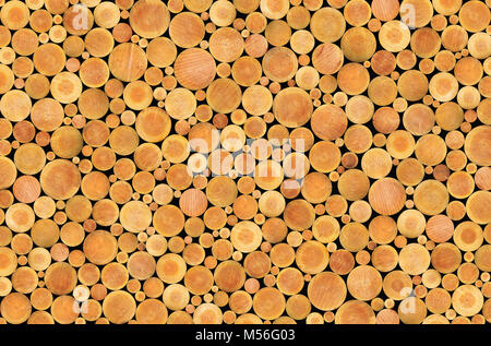 Freshly cut and stacked wood logs - Wooden abstract background Stock Photo
