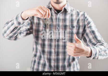 House key in hand Stock Photo