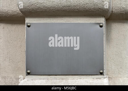 Empty Silver Plaque at Building Exterior Stock Photo