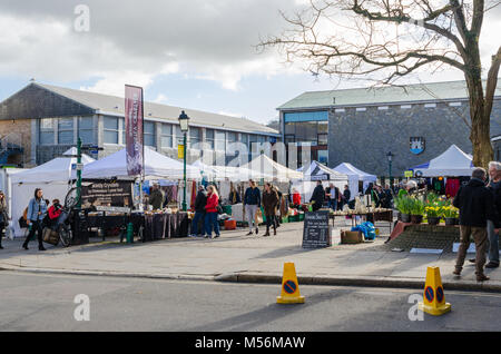 The Saturday market in the market square in the Devon town of Totnes Stock Photo