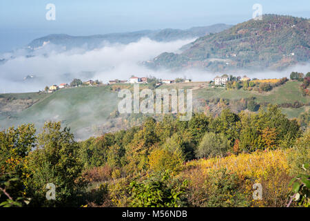 Mist over the mountains of Oltrepò pavese near Varzi, province of Pavia, Lombardy, northern Italy Stock Photo