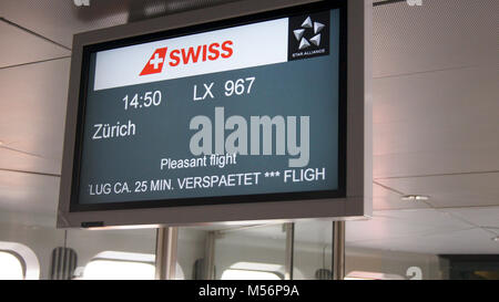 BERLIN, GERMANY - MAR 31st, 2015: A departure display at the Berlin Tegel Airport gate, SWISS flight to Zurich Stock Photo
