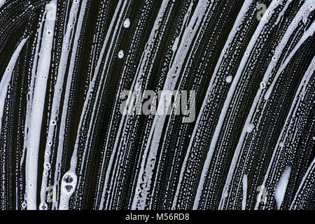 Still life of a large sponge with water and soapsuds on a slate table Stock  Photo - Alamy