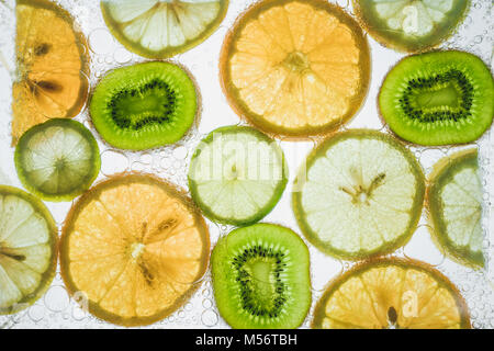 citrus slices floating in water  Stock Photo
