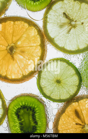 citrus slices floating in water  Stock Photo