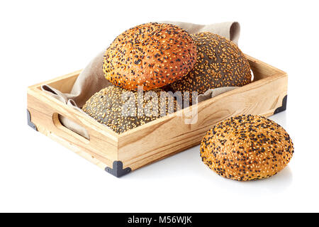 Wooden tray with burger buns on white Stock Photo