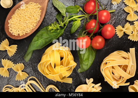 different types of fresh raw italian ravioli on the table with cooking ...