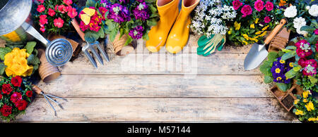 Gardening Top View Composition - Tools And Flowerpots On Wooden Table Stock Photo