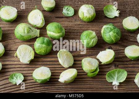 Brussels sprouts (Brassica oleracea) on old wooden table Stock Photo