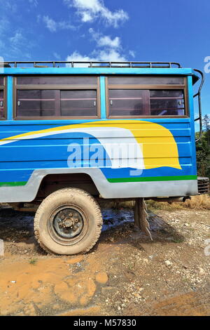 Filipino white-yellow-blue dyipni-jeepney car. Public transportation in Sagada town-originally made from US.military jeeps left over from WW.II locall Stock Photo