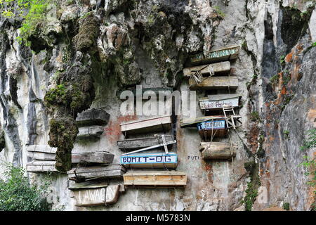 Sagada, Philippines-October 9, 2016: The Igorots practice unique funerary customs-the dead are buried in coffins tied or nailed to cliffs. Sagada-Moun Stock Photo