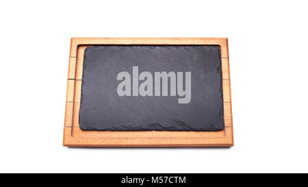 Old stained clean empty rectangular wooden cutting board isolated on white in an oblique low angle view for food placement. Stock Photo