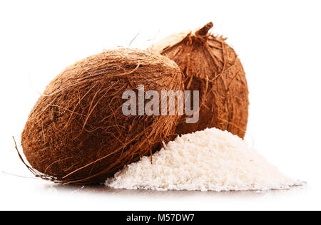 Composition with shredded coconut and shells isolated on white background Stock Photo