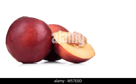 Ripe juicy nectarines isolated on white background. Stock Photo
