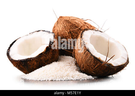 Composition with shredded coconut and shells isolated on white background Stock Photo