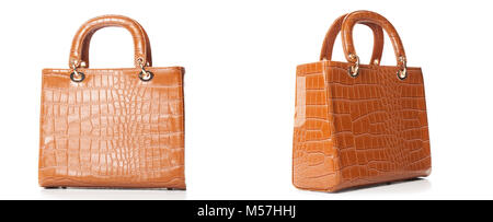Terracotta women handbag isolated over white,Light brown glossy handbag isolated on white background. Stock Photo