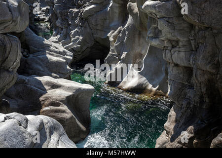 Rock formations in the Maggia river in the Maggia Valley,Valle Maggia,Ponte Brolla,Canton of Ticino,Switzerland Stock Photo