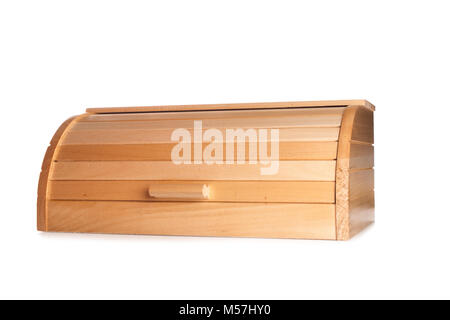 Ginger cat's paw sticking out of a wooden bread box. Isolated on white.. Stock Photo