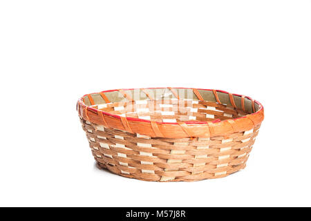 Empty wooden fruit or bread basket on white background. Stock Photo