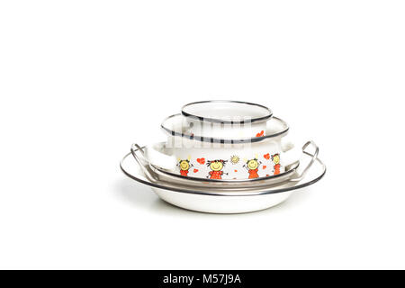 Colorful metal  bowls and plates. Isolated on white background. Stock Photo
