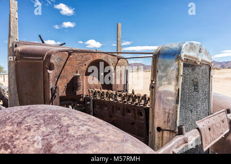 Old and abandoned car engine in the Namibia desert, spot known as solitaire. Stock Photo
