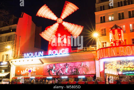 The Moulin Rouge , Paris, France. It is a famous cabaret built in 1889, locating in the Paris red-light district of Pigalle Stock Photo