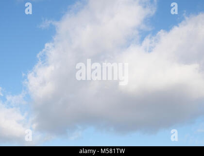 February 2018 - White clouds and a bright blue sky Stock Photo