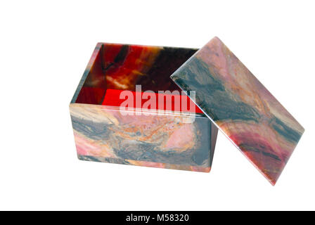 small simple stone box of polished rhodonite with an open lid isolated Stock Photo