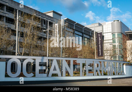 Ocean Terminal name in large curved letters outside the shopping Mall, Leith harbour, Edinburgh, Scotland, UK Stock Photo
