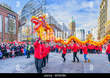 VanCity Credit Union Dragon Dance team, Chinese Lunar New Year Parade, Chinatown, Vancouver, British Columbia, Canada. Stock Photo