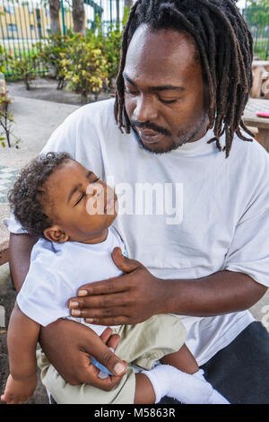 Miami Florida,Liberty City,African Square Park,inner city,low income,poverty,economic,Black Blacks African Africans ethnic minority,man men male adult Stock Photo