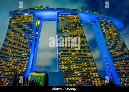 SINGAPORE, SINGAPORE - JANUARY 30, 2018: Beautiful below view of Marina Bay Sands at night the largest hotel in Asia. It opened on 27 April 2010 Stock Photo