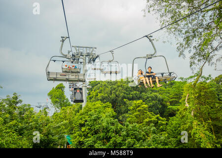 SINGAPORE, SINGAPORE - JANUARY 30, 2018: Outdoor view of unidentified people at Singapore Sentosa Cable Car and Skyline Luge, Singapore Stock Photo